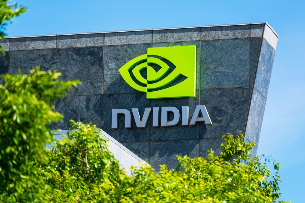 Nvidia,Logo,And,Sign,On,Headquarters.,Blurred,Foreground,With,Green